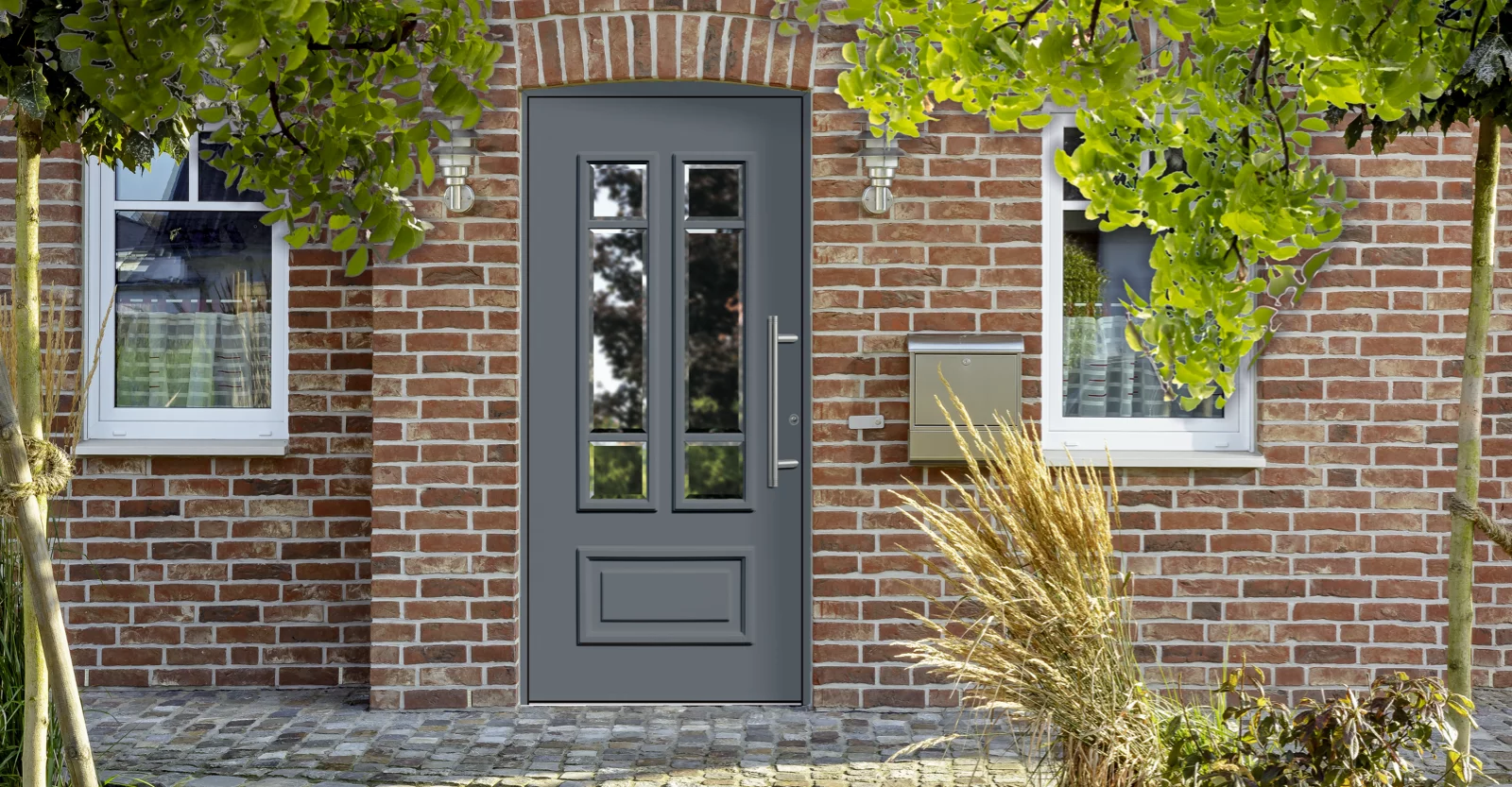 Hausfassade mit dem Modell Rivira in classica grau
